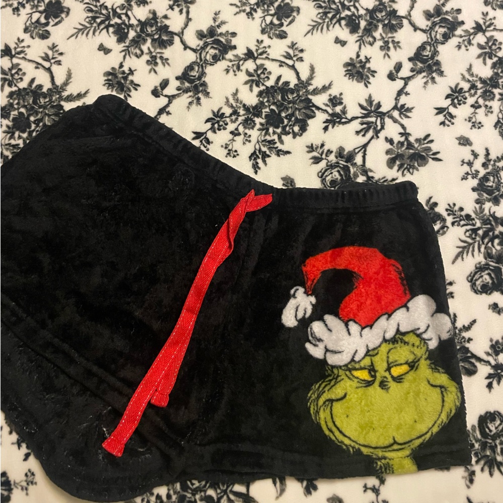 Two pair of the Grinch shorts